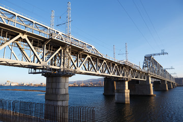 Railroad bridge winter river