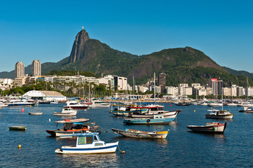 Fototapeta na wymiar Rio de Janeiro City with Christ the Redeemer and Boats