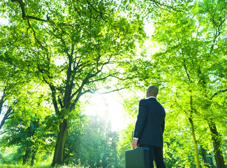 Green Businessman in the Woods