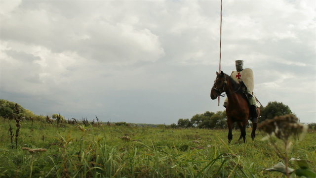 Medieval knights on horseback.