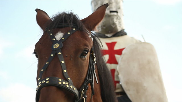 Medieval knights on horseback.