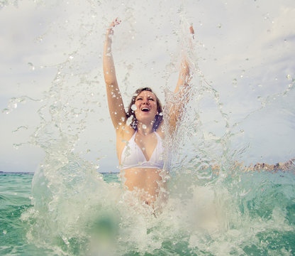 Woman enjoying her vacation in the sea.