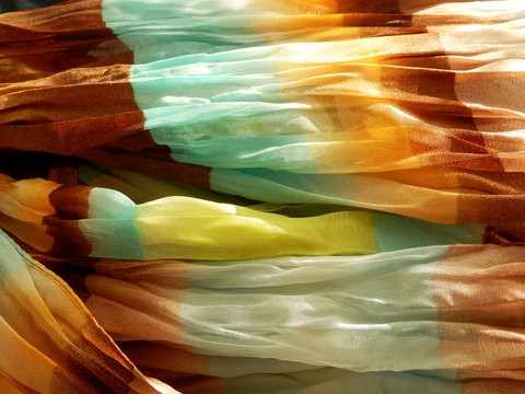 detail photography of colorful scarf