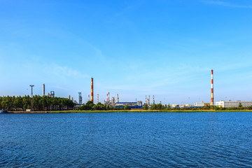 Fototapeta premium Landscape of river and oil refinery factory.