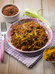 red rice with curry and leek