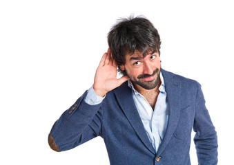 Man listening over isolated white background