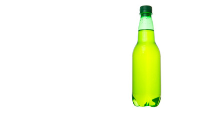 Green colored soda drinks in bottles over white background 