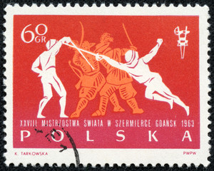 stamp printed in Polska shows fencers and dragoons