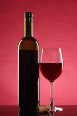 Wine and autumn leaves