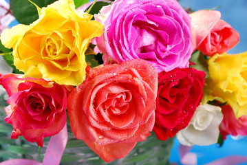 Fototapeta na wymiar colorful roses in wicker basket