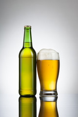 Beer in glass and bottle ready for branding