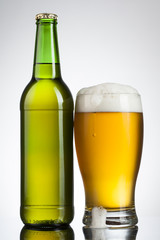 Beer in glass and bottle ready for branding