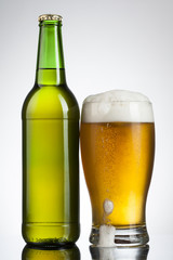 Beer in glass and bottle ready for branding