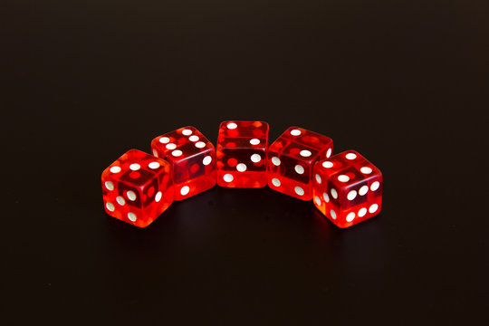 numbered dice game isolated in black background