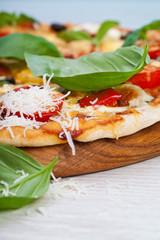 Delicious fresh pizza served on wooden table