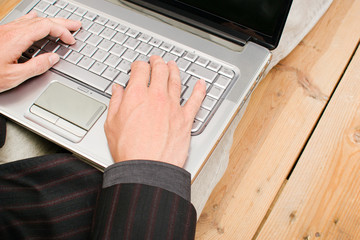 Fototapeta premium Businessman with a computer