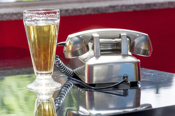 phone and beer in a bar