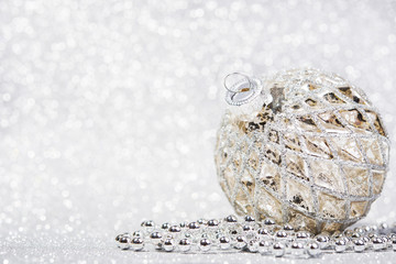 Festive Christmas decoration on abstract silver background
