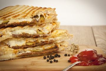 toasted meat ( turkish kavurma ) and cheese sandwich