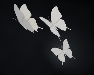 Drie papieren vlinders in de nacht