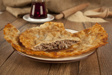 Turkish meat pie fried Cig borek Raw pie or Tatar pie