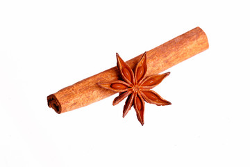 Cinnamon stick and stars anise isolated on a white background