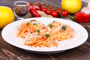 Italian pasta with tomato sauce, cheese and mint