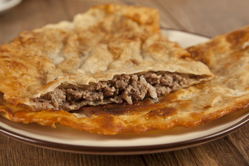 Turkish meat pie fried Cig borek Raw pie or Tatar pie