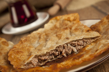 Turkish meat pie fried Cig borek Raw pie or Tatar pie