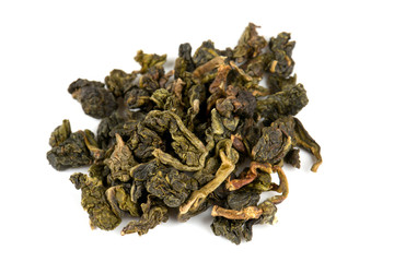 dried green tea isolated on white