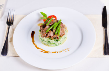 Tasty Beef Meat and Beans on Risotto Dish