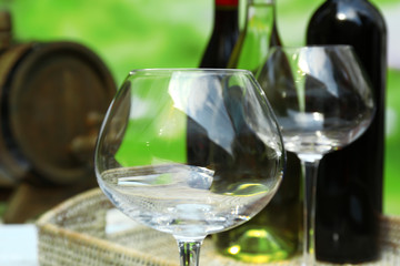 Red wine pouring into wine glass, close-up