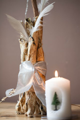 Christmas decoration - white candle with Christmas tree
