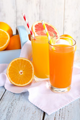Orange and carrot juice in glasses