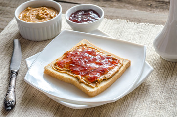 Sandwich with peanut butter and strawberry jelly