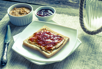 Sandwich with peanut butter and strawberry jelly