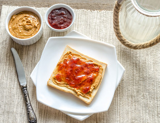Sandwich with peanut butter and strawberry jelly