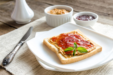 Sandwich with peanut butter and strawberry jelly