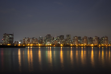 Fototapeta na wymiar Seoul skyline by night, the south side of the Han River