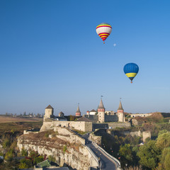air balloon's above the old castle