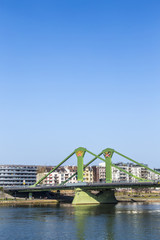 Fototapeta premium View of the city with Floessserbruecke at Frankfurt