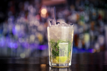 Cocktail with lime, rum and mint
