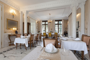 Fototapeta na wymiar Interior of a restaurant in luxury villa 