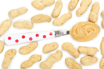 Creamy peanut butter in spoon, close-up