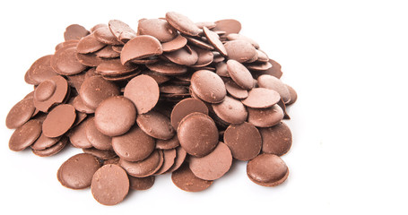 Chocolate button over white background