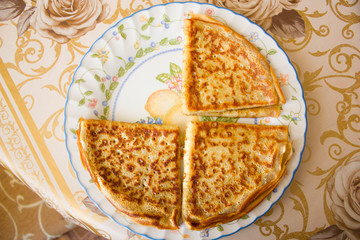 three freshly cooked pancake on a plate