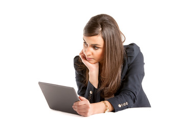 Young business woman working on tablet.