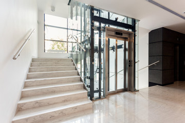 Hall with staircase and elevator - obrazy, fototapety, plakaty