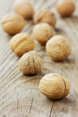 Walnuts on a wooden rustic board
