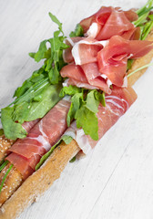 Parma ham prosciutto with grissini bread sticks